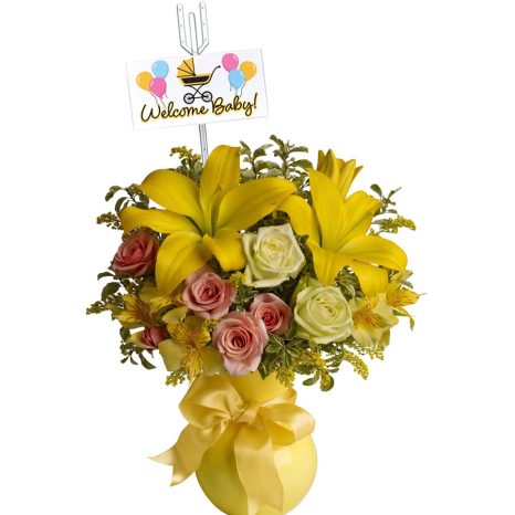 A bouquet of yellow lilies, white roses, and pink roses in a yellow vase, adorned with a yellow ribbon. A card with colorful balloons reads "Welcome Baby!.